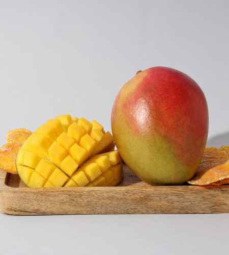 ripe-juicy-mango-wooden-board_185193-161769